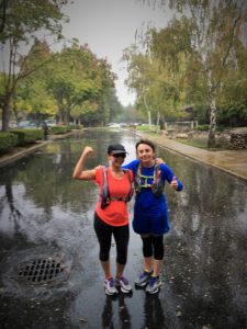 My friend Elisia and I ran the whole time together and finished strong in the rain. She told me: "We never walk to the finish line. Let's finish strong." OUr last miles were wet, too, as it started to rain. 